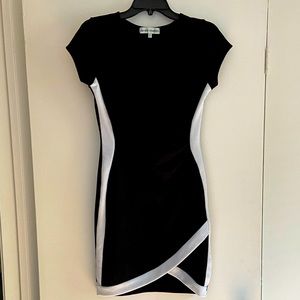 Short dress. Juniors L, but fits 4-6.